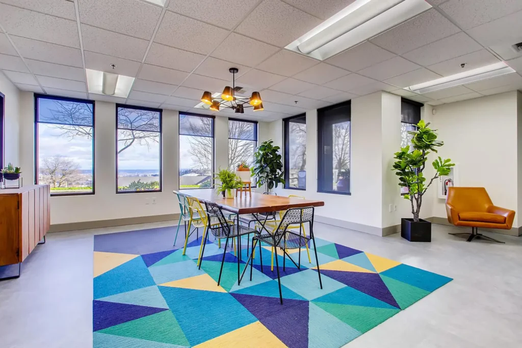 Clubhouse, large table with chairs and lots of windows