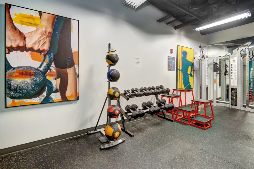 Fitness center with free weights at VUE25 apartments in Tacoma, Washington