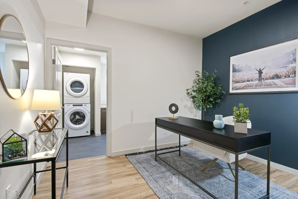 Foyer with desk nook and blue accent wall