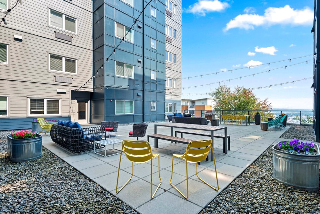 a large courtyard with outdoor furniture